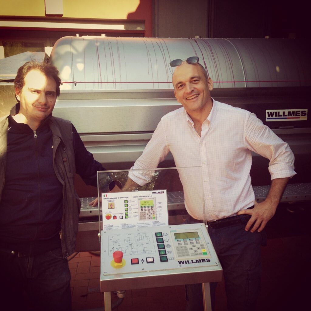 Roberto and Antonio in front of the new press